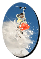 3D Lenticular Images foam key chain with oval shaped, snow skiier launches off a mountain into the crisp Alpine air, flip