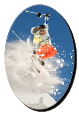3D Lenticular Images foam key chain with oval shaped, snow skiier launches off a mountain into the crisp Alpine air, flip